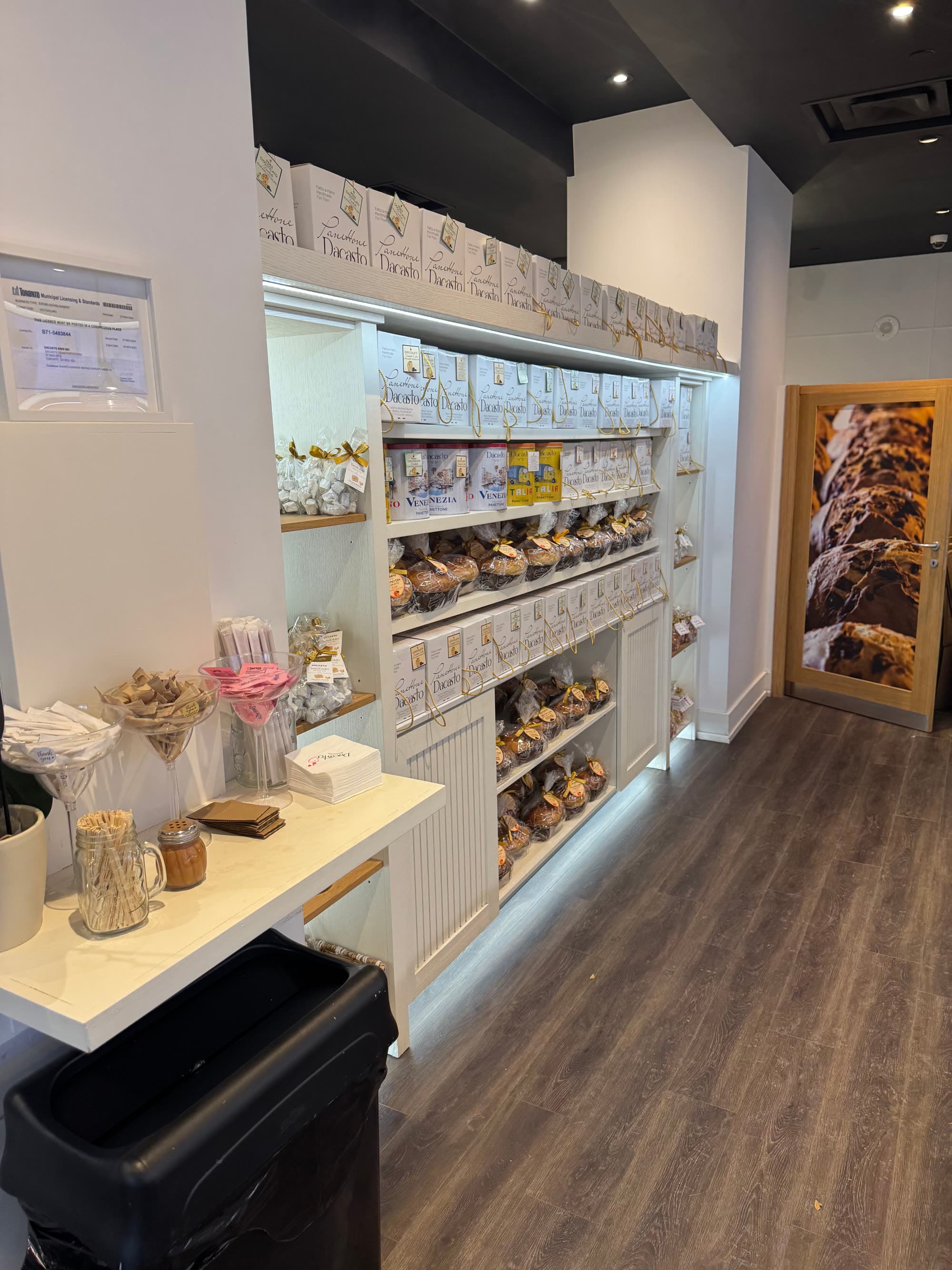 Shelves of panettone inside Dacasto Gran Pasticceria